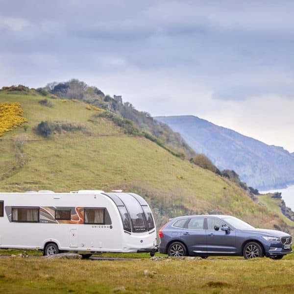 bailey unicorn series 5 touring caravan located on a green banking overlooking the sea